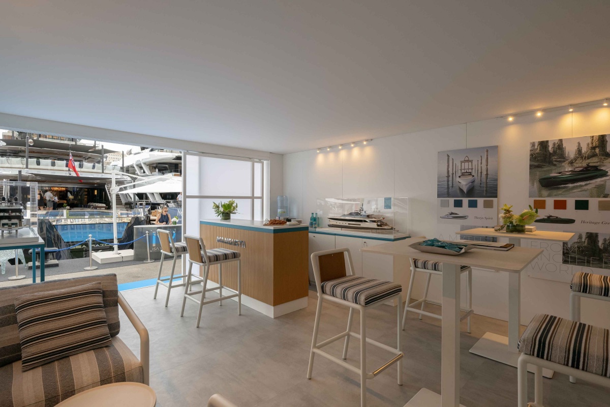 Mangusta exhibition space at Monaco Yacht Show 2026 with custom-made furnishings and wood finishes